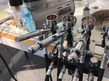 four airbrushes