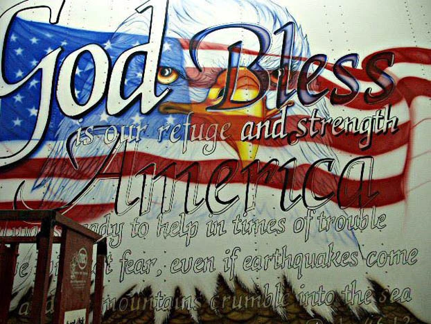 God bless america on side of a cemi truck